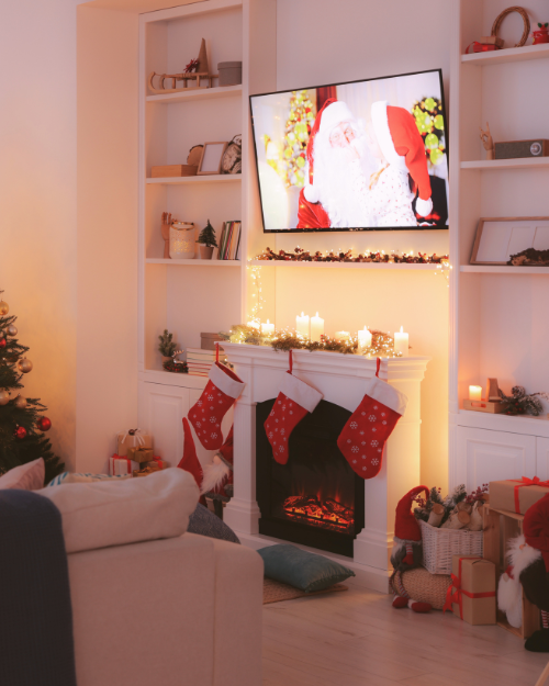 simple christmas mantel with tv above