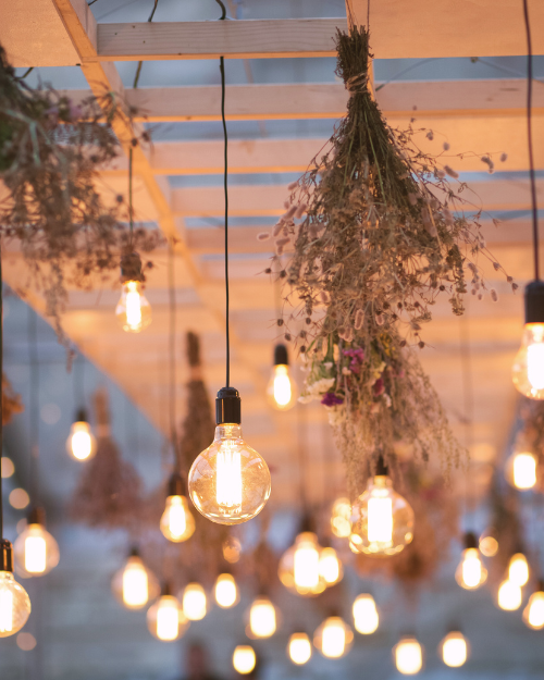 fall wedding lighting and heather decor