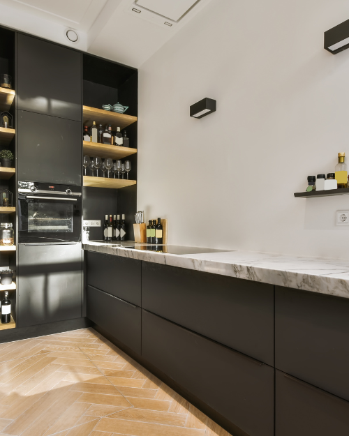 small modern kitchen with black accents