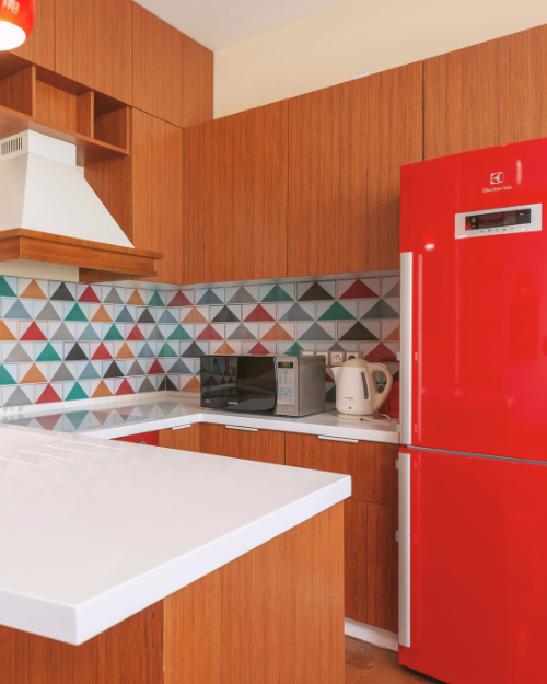 kitchen with red refrigerator