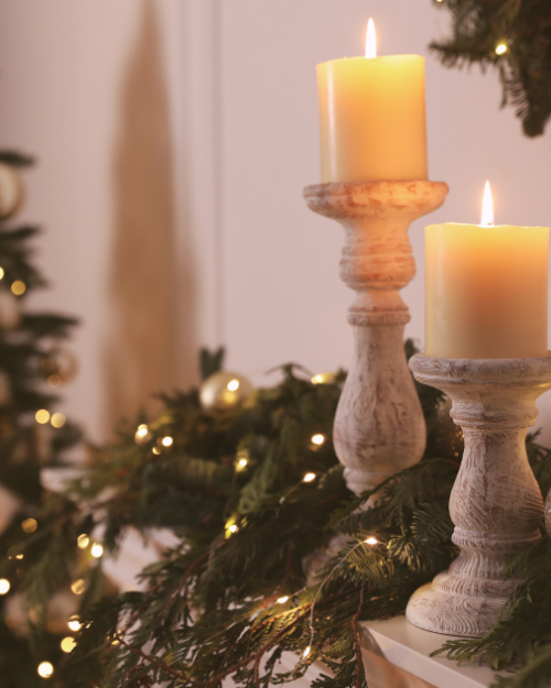 christmas mantel with swag and candles