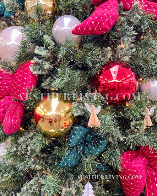 red and gold themed christmas tree