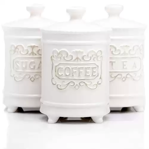 25 Ounce Elegant Ceramic Kitchen Canisters Set of 3 - Beautifully Engraved Coffee Tea Sugar Storage Containers Airtight with Feet for Added Style and Stability - Ceramic Jar with Lid That's Airti...