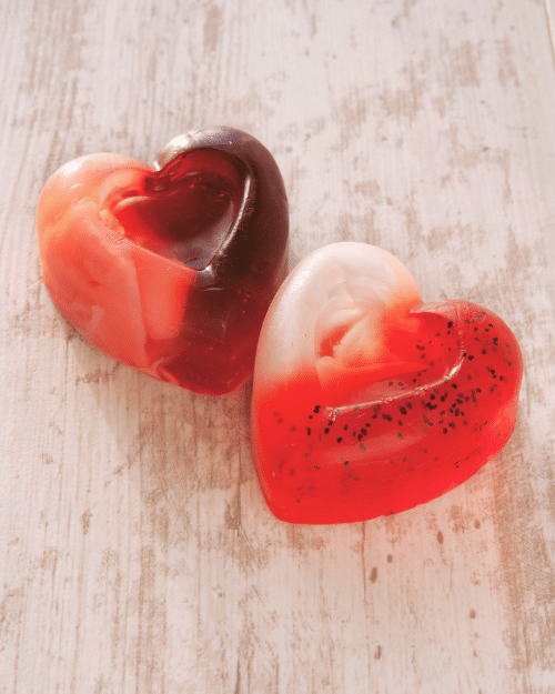 heart shaped soaps with different shades of red