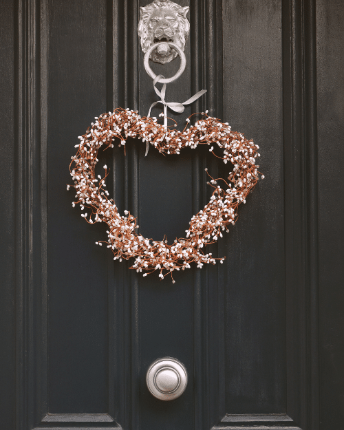 heart shaped wreath hung on door